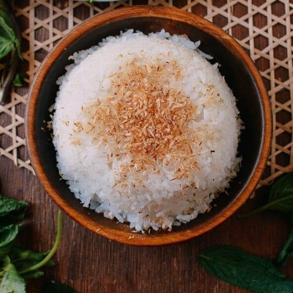 Coconut rice with toasted coconut flakes